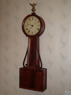 Unmarked banjo     clock, Full front view.