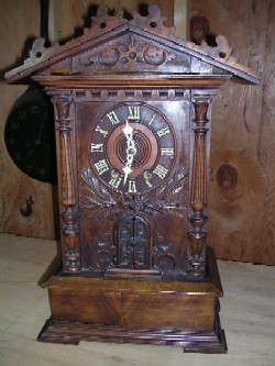 Black Forest trumpeter clock, Full front view.